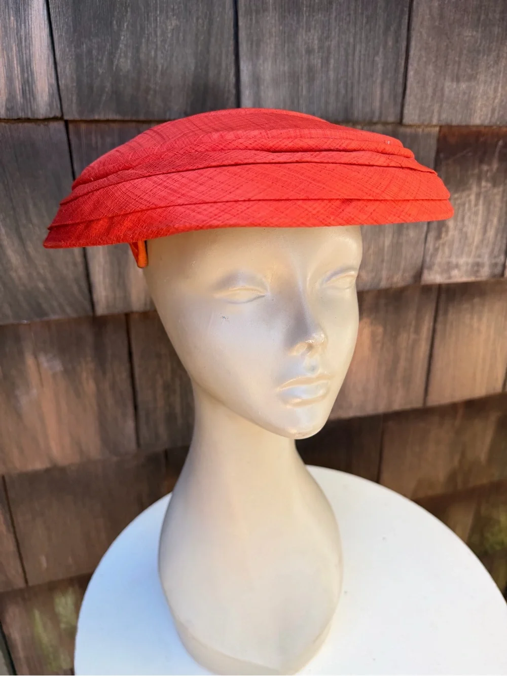 Vintage 1960s saucer style hat rusty orange fabric bow size OS no label.